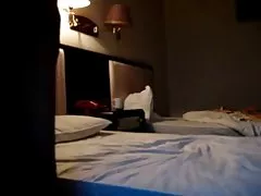Chiński para amatorów w hotelu